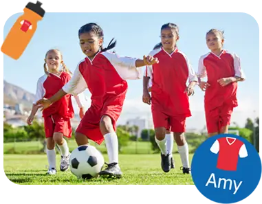 équipe de football de l'école de filles en maillot rouge